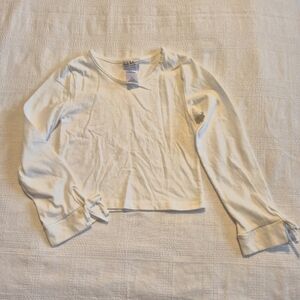 Nicole Miller girls size 6X white long sleeve cropped shirt, 2 marks on back
